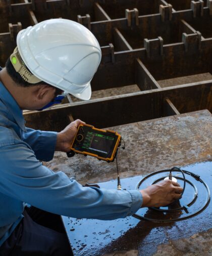 Ultrasonic test to detect imperfection or defect of steel plate in Workshop, NDT Inspection.