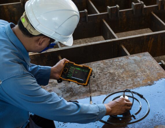 Ultrasonic test to detect imperfection or defect of steel plate in Workshop, NDT Inspection.
